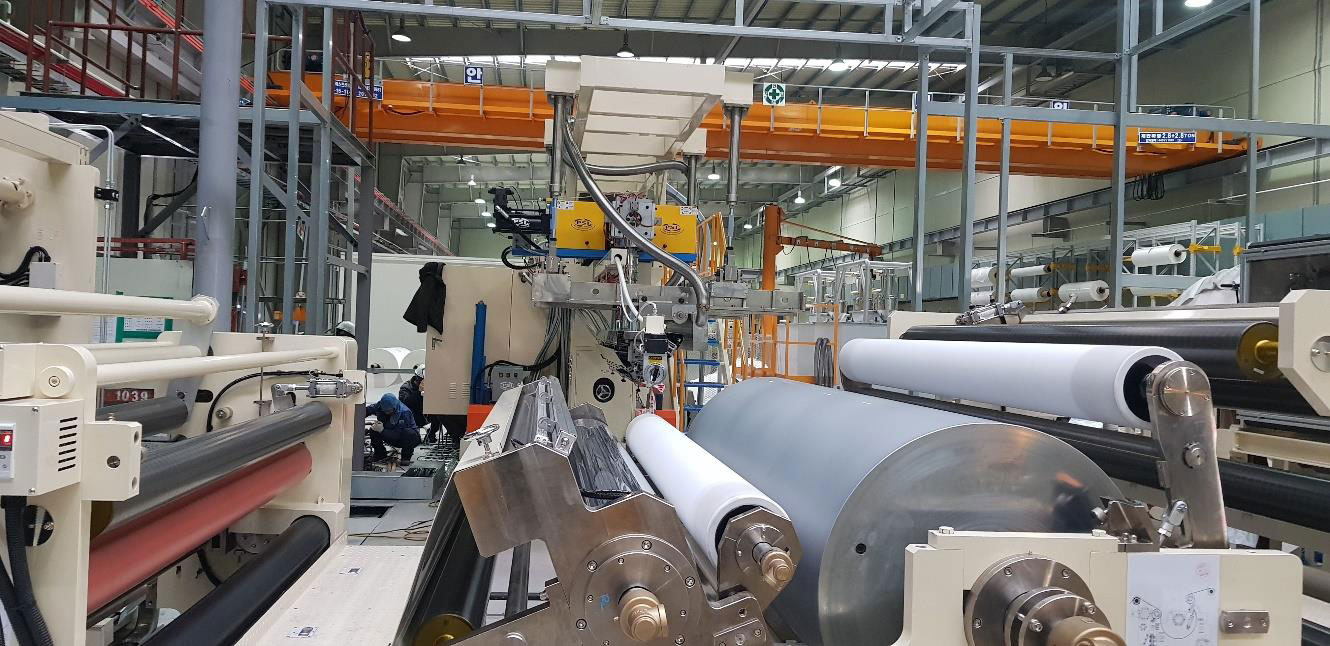 EXTRUSION LAMINATOR